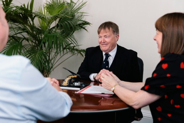 Robert Allan discussing a legal matter