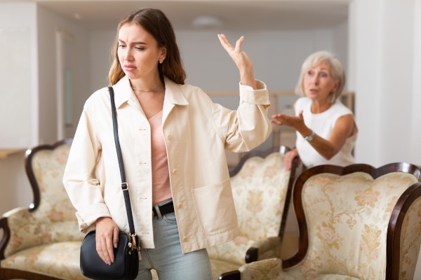 Two women arguing over informal Will changes in Scotland
