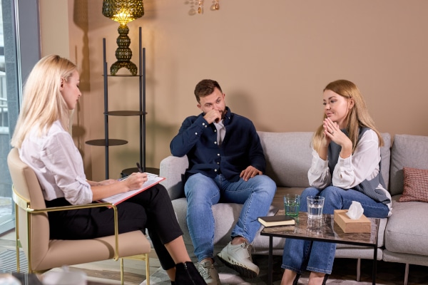 Separating parents meeting with a family law solicitor to discuss child contact and residence arrangements in Scotland