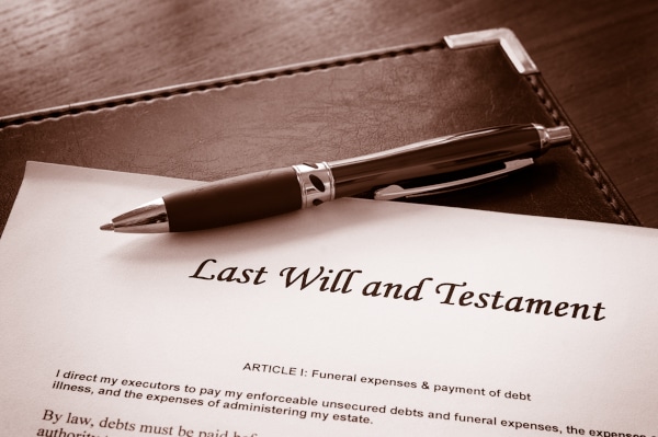 Last Will and Testament document with pen, representing intestacy and succession planning in Scotland