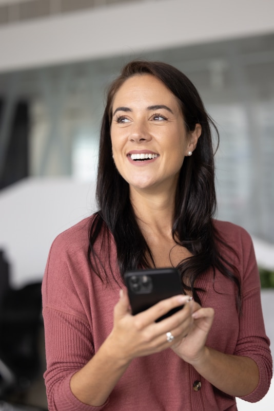 Worker reviewing a shift schedule on a smartphone
