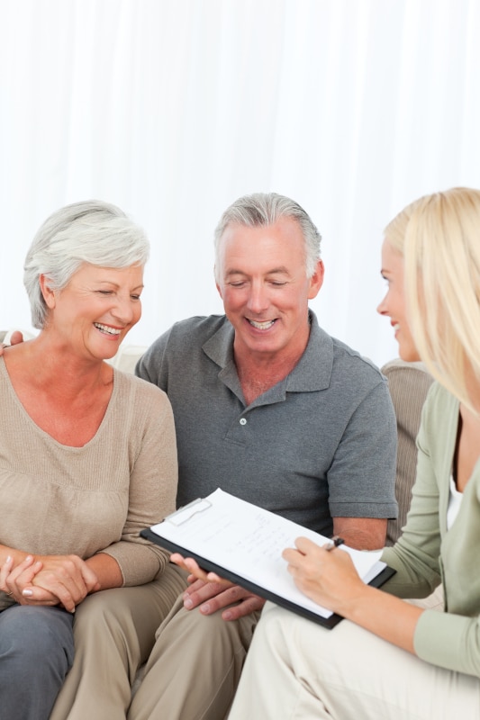 Solicitor providing independent legal advice on equity release to a couple in Scotland