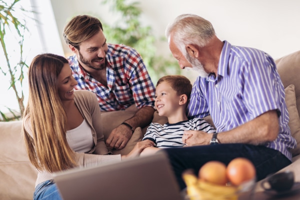 Three generations of a family together, reflecting the importance of updating a Will after children and grandchildren