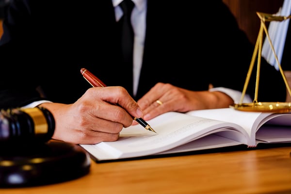 Sheriff court gavel and papers representing a contempt of court finding over a child contact order
