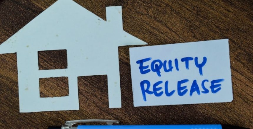 Image showing a cutout house with a note beside it saying "equity release" expounding the benefits of equity release